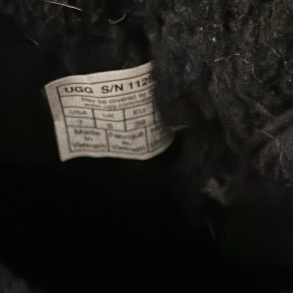 UGGs for sale. Women’s size 7. They are black with gold and a bow on the back. - Picture 3 of 6